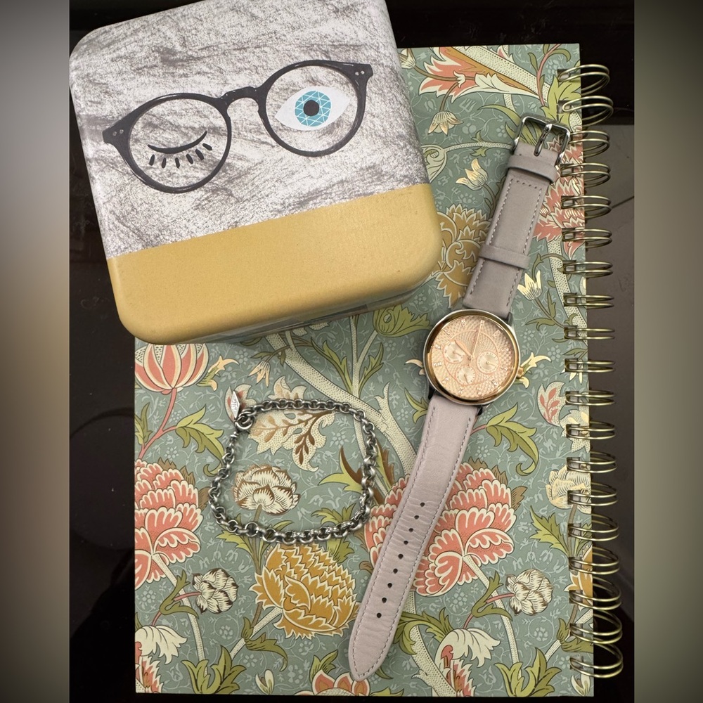 Fossil Gold Watch and bracelet set.